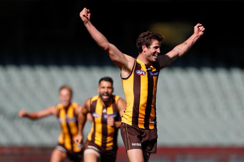 Ben Stratton of the Hawks kicks and celebrates a goal during the 2020 AFL Round 18 match between the Hawthorn Hawks and the Gold Coast Suns at Australia's Adelaide Oval. Getty Images