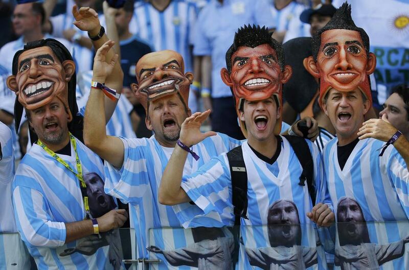 Fans of Argentina cheer before their team's match against Iran on Saturday at the 2014 World Cup in Belo Horizonte, Brazil. Kai Pfaffenbach / Reuters