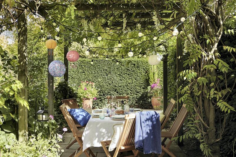 Twinkly lights lend an outdoor space a warm and cosy feel. Photo Lights4fun