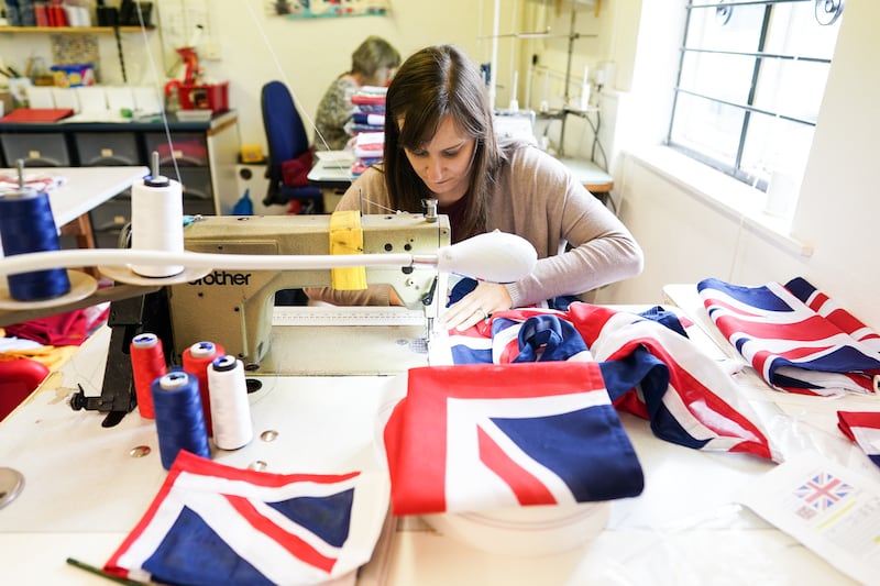 Fiona Baxter makes Union flags at the Flying Colours Flagmakers factory in Knaresborough. Getty Images