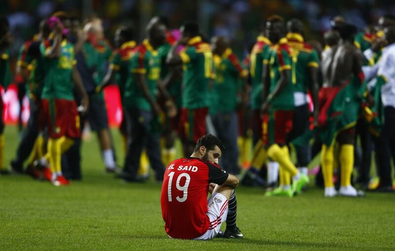 Egypt’s Abdallah El Said looks dejected after the game. Amr Abdallah Dalsh / Reuters
