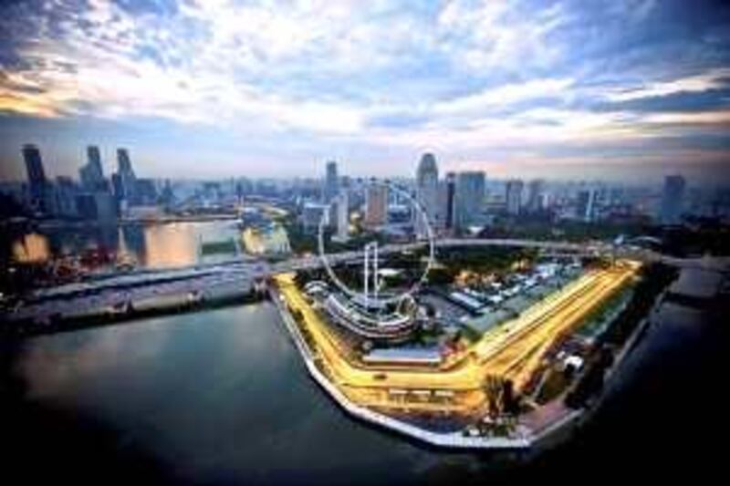 This Sept. 18, 2009 photo released by the Singapore Tourism Board, shows an aerial view of the Marina Bay Circuit in Singapore. The Formula One Singapore Grand Prix is scheduled on this street course on Sunday night, Sept. 27. (AP Photo/Singapore Tourism Board) *** Local Caption ***  SIN112_Singapore_Auto_Racing_F1_GP.jpg *** Local Caption ***  SIN112_Singapore_Auto_Racing_F1_GP.jpg