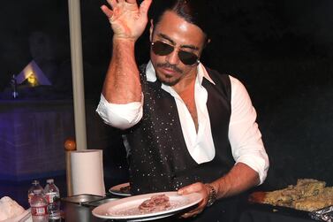 Nusret ‘Salt Bae’ Gokce throws his signature seasoning move.  The partners behind the Nusr-Et steakhouse chain are weighing up a potential stake sale that could place a $1 billion valuation on the business. Getty Images.