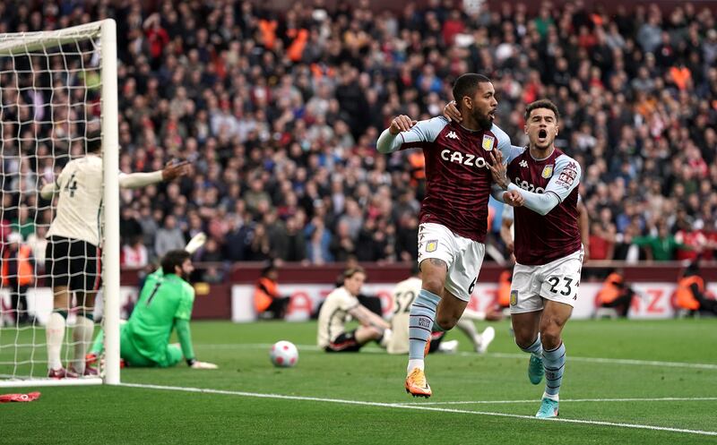 Aston Villa's Douglas Luiz celebrates scoring the first goal of the game with teammate Philippe Coutinho. PA