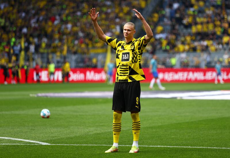 Borussia Dortmund's Norwegian forward Erling Haaland waves farewell to the fans before his final home and departure for Manchester City game against Hertha Berlin on May 14, 2022. Getty