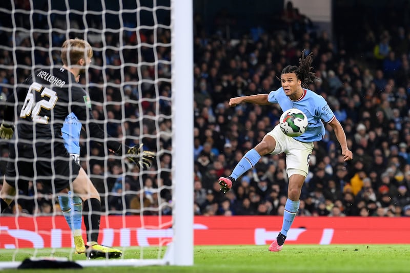 Nathan Ake of Manchester City scores his team's third goal during the League Cup match against Liverpool at the Etihad Stadium on Thursday, December 22, 2022. Getty