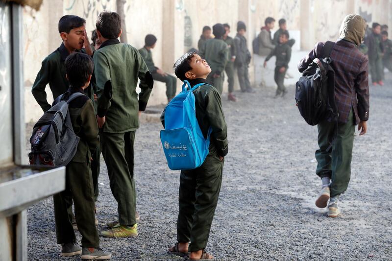 Yemeni students arrive at school on the start of a new year at a public school in Sana'a, Yemen. EPA