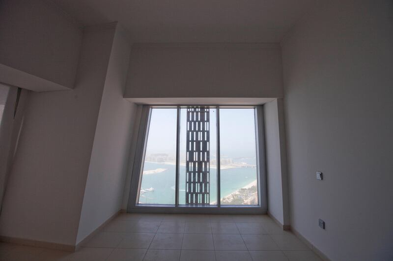 Dubai, United Arab Emirates - June 11 2013 - The interior of a 57th floor four bedroom duplex apartment at the Cayan Tower in the Dubai Marina.  (Razan Alzayani / The National)