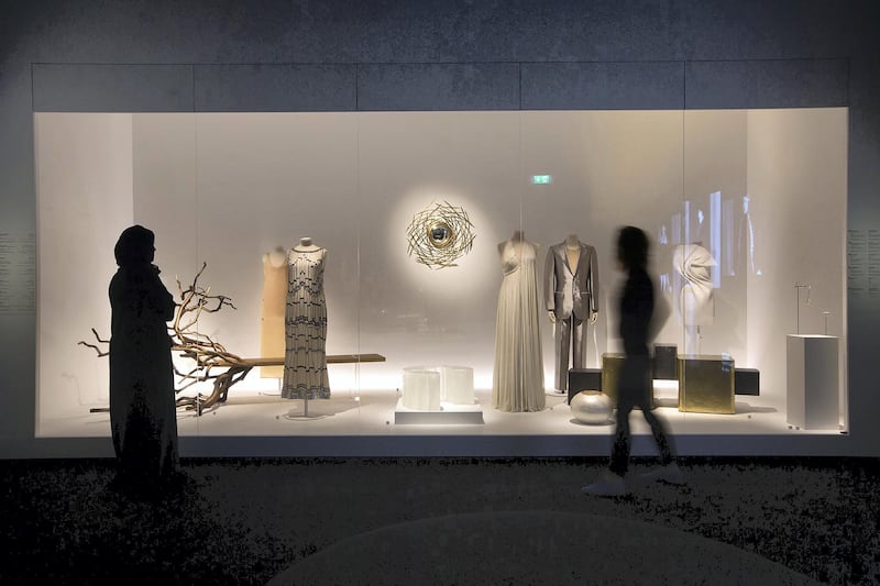 Visitors explore '10,000 Years of Luxury' at Louvre Abu Dhabi. Courtesy of the Department of Culture and Tourism – Abu Dhabi. Photo by Ismail Noor