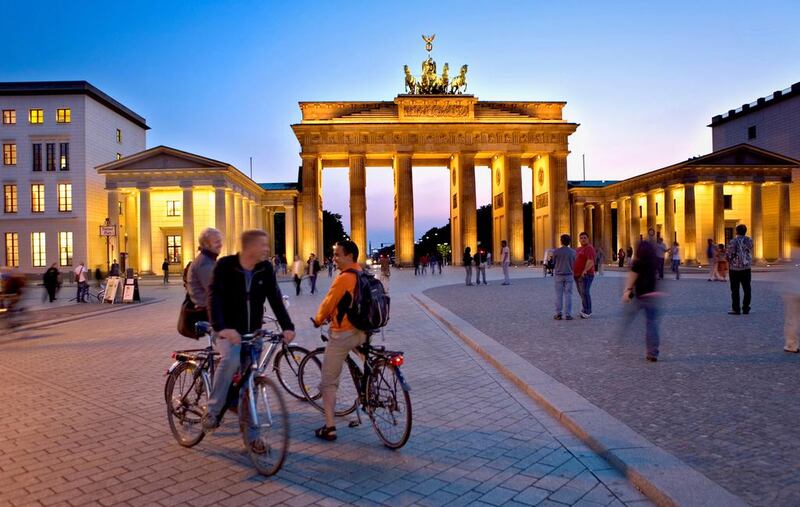 The historic Brandenburg Gate is one of the best-known monuments in the newly revitalised West Berlin. Lucas Vallecillos / Alamy Stock Photo