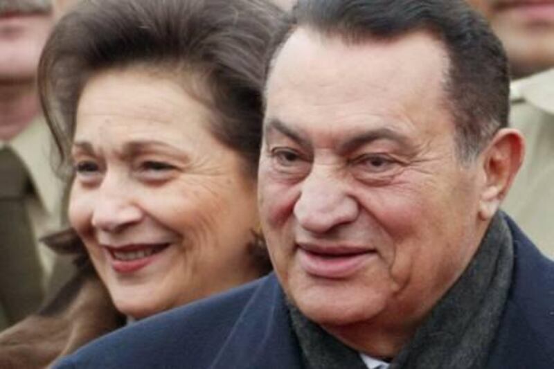 Egypt's President Hosni Mubarak is accompanied by his wife Suzanne (L) upon his arrival at Berlin's Tegel airport in this February 18, 2003 file photo. Egypt's Vice President Omar Suleiman said on February 11, 2011 that Mubarak had bowed to pressure from the street and had resigned, handing power to the army, he said in a televised statement.  REUTERS/Arnd Wiegmann/Files (GERMANY - Tags: POLITICS) *** Local Caption ***  BER01D_EGYPT-MUBARA_0211_11.JPG