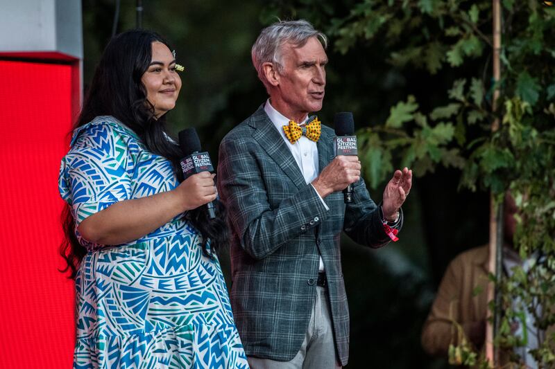 Samoan activist Brianna Fruean and Bill Nye the Science Guy speak at the Global Citizen Festival. AP