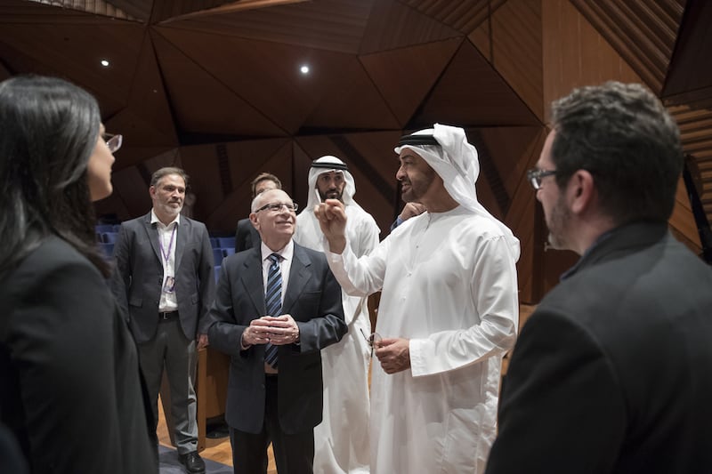 Sheikh Mohamed bin Zayed, Crown Prince of Abu Dhabi and Deputy Supreme Commander of the Armed Forces, speaks with Al Bloom, then vice chancellor of NYU Abu Dhabi, during a visit to the university in 2017. Photo: Ryan Carter / Crown Prince Court - Abu Dhabi