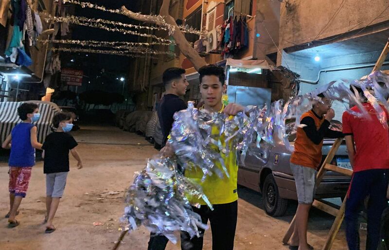 Egyptian youths prepare decorations for the Muslim holy month of Ramadan. Reuters