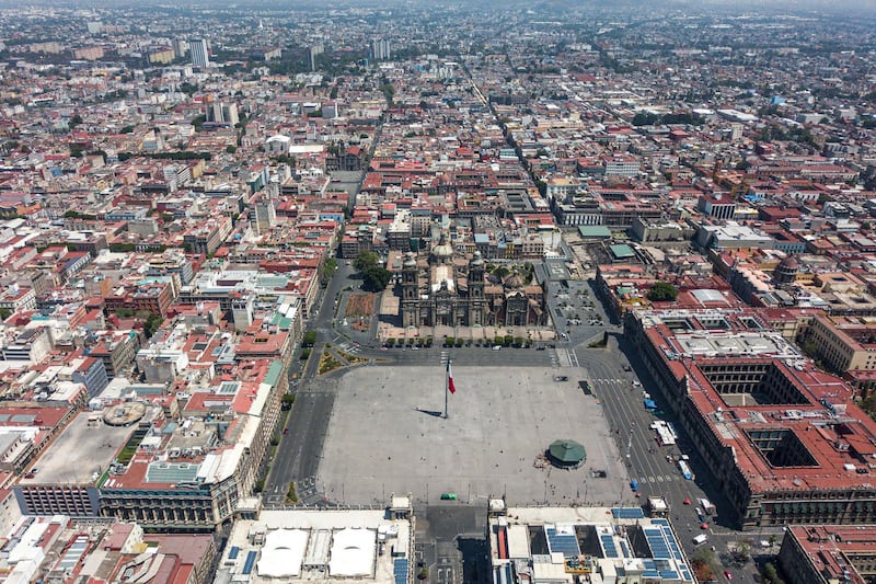 MEXICO CITY, MEXICO - MARCH 31: Aerial drone view of Zocalo square on March 31, 2020 in Mexico City, Mexico. After being criticized for its slow response to the virus, Mexican Government announced the health emergency nationwide and suspended all non-essential jobs until April 30. Mexico has reported 28 deaths and over 1,000 positive cases. (Photo by Hector Vivas/Getty Images)
