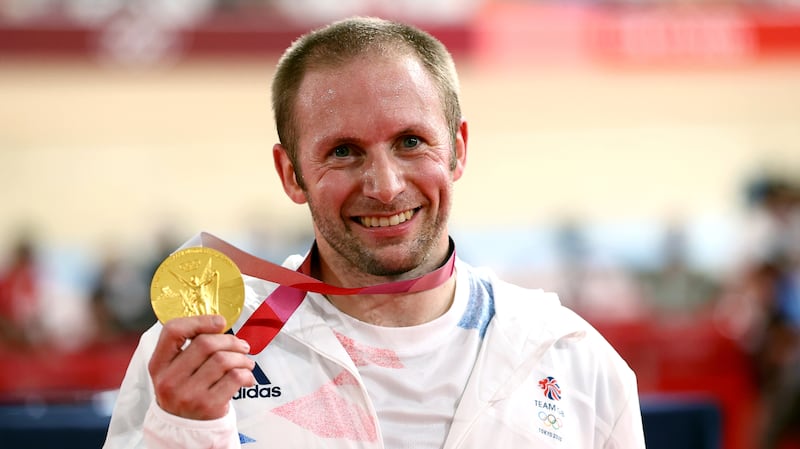 Jason Kenny poses with his gold medal.