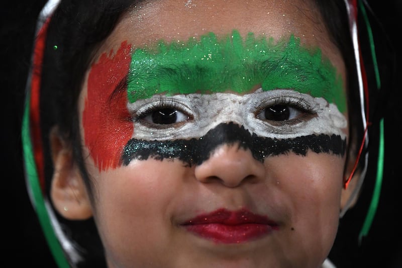 A UAE fan celebrates after the 2019 AFC Asian Cup quarter final match between Australia and UAE in Al Ain.  EPA