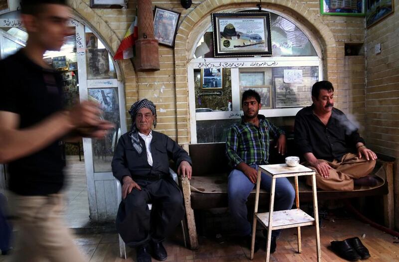 He used to hang photos on its walls, much to the chagrin of his boss, who “hated it” but let him continue because he worked hard. Safin Hamed / AFP  