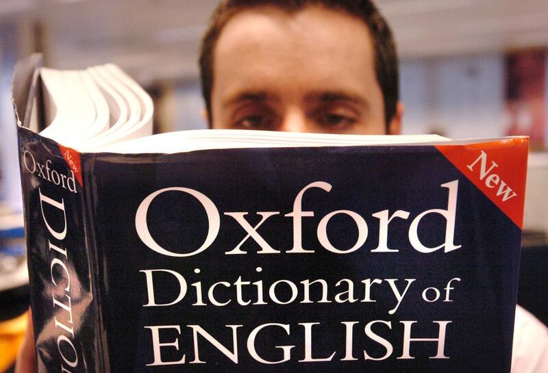 A man reading a copy of the Oxford Dictionary of English. The Oxford Dictionaries name 'post-truth' the word of the year in 2016. PA Wire/PA Images