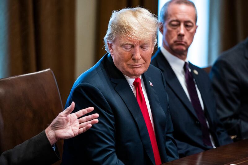 US president Donald Trump and the Republican Representative from Texas Mac Thornberry  listens to members of Congress in the Cabinet Room of the White House, Washington, DC. Jim Lo Scalzo / EPA