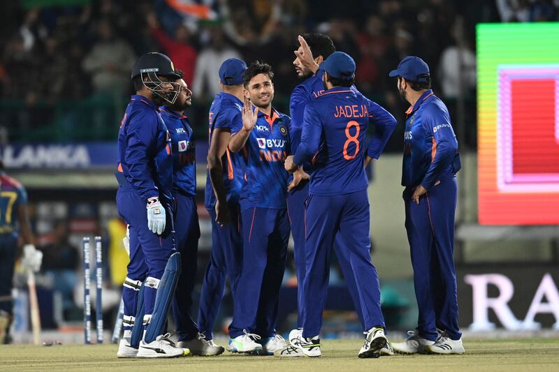 Leg spinner Ravi Bishnoi, centre, celebrates the dismissal of Sri Lanka's Janith Liyanage. AFP