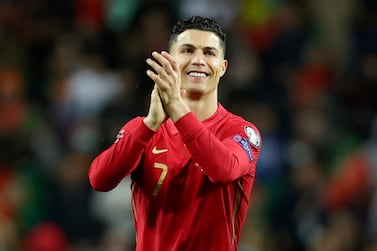 Portugal's Cristiano Ronaldo and Pepe, right, celebrate at the end of the World Cup 2022 playoff soccer match between Portugal and North Macedonia, at the Dragao stadium in Porto, Portugal, Tuesday, March 29, 2022.  Portugal won 2-0.  (AP Photo / Luis Vieira)