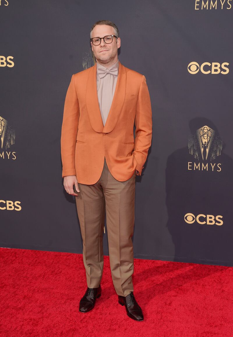 Seth Rogen in an orange Brioni jacket. AP