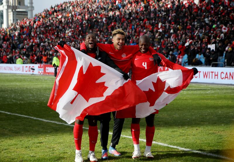 Canada players celebrate after qualifying for the 2022 World Cup. Reuters