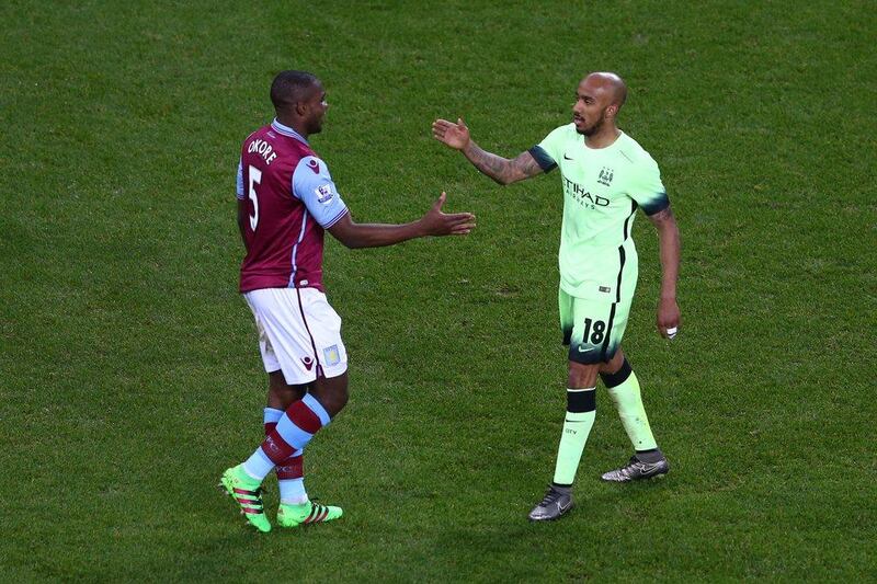 Fabian Delph of Manchester City and Jores Okore of Aston Villa go to shake hands after their FA Cup match on Saturday. Michael Steele / Getty Images