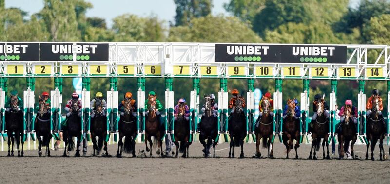 Runners in The Unibet Thanks The Frontline Workers Handicap at Kempton Park Racecourse in England on Monday July 13. PA