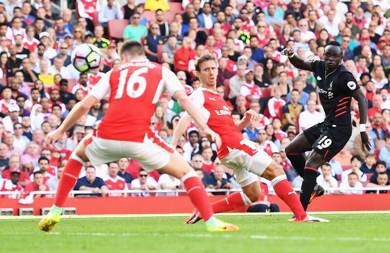 LONDON, ENGLAND - AUGUST 14:  Sadio Mane of Liverpool scores his team's fourth goal during the Premier League match between Arsenal and Liverpool at Emirates Stadium on August 14, 2016 in London, England.  (Photo by Michael Regan/Getty Images)