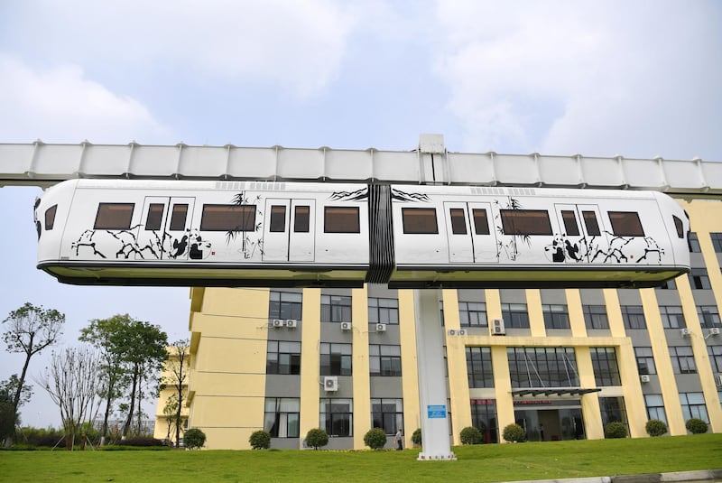 Mandatory Credit: Photo by Shutterstock (8969444l)An elevated new energy monorail train travels along a 1.4km air rail at China Sky Railway in Chengdu city, southwest China's Sichuan provinceWorld's first new energy air train created, Chengdu city, Sichuan Province, China - 18 Jul 2017This new energy test air rail was set up in 5 meters above the ground with ''U'' shape and total length of 1.4km. China is the third country to create air rail hot on the heels of Japan and Germany. But what's the difference is this Chinese air train is driven by Lithium battery pack instead of high tension electricity. This is the first creation in the whole world. The operation noise of this air train is much lower than those wheel-track ones. What's more, it has no exhaust gas pollution and electromagnetic radiation. Constructed in the air, this air train will not affect the ground transportation.