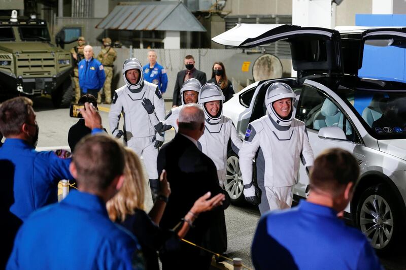 Nasa astronauts Shane Kimbrough and Megan McArthur, Jaxa astronaut Akihiko Hoshide and Esa astronaut Thomas Pesquet arrive to board the SpaceX Falcon 9 rocket. Reuters