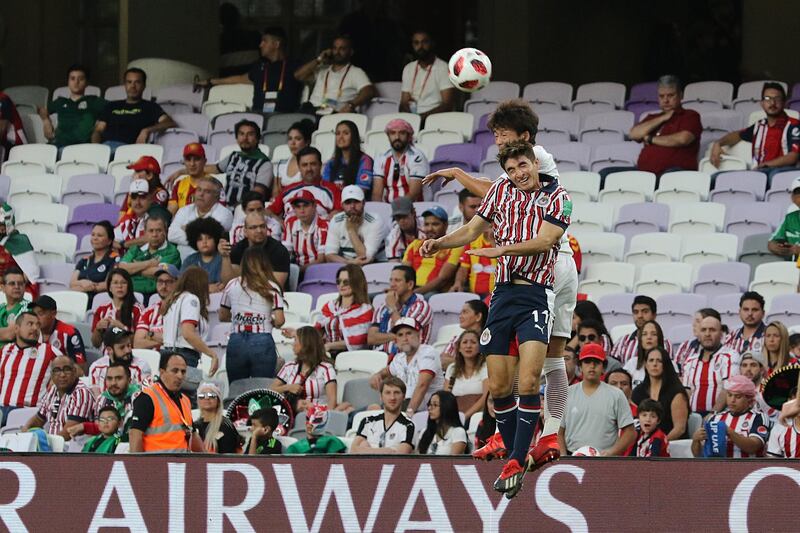 Isaac Brizuela, front, of CD Guadalajara in action. EPA