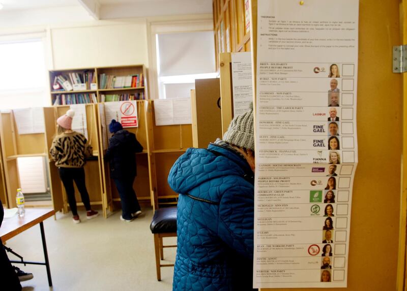 Irish people vote in general elections at a polling station in Dublin, Ireland.  EPA