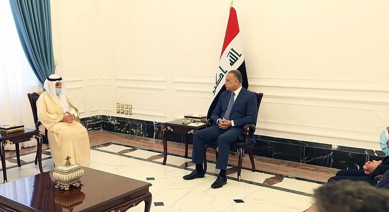 Iraqi Prime Minister Mustafa Al Kadhimi receives Kuwaiti Foreign Minister Ahmad Nasser Al Sabah . Courtesy of Iraq Media Office of Prime Minister Twitter account