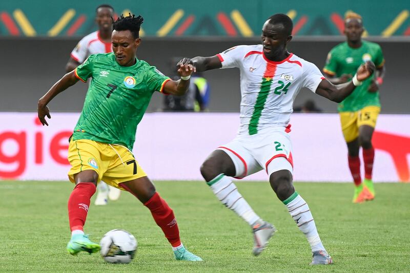 Ethiopia's midfielder Surafel Dagnachew, left, is marked by Burkina Faso's midfielder Adama Guira during their Afcon match at Stade de Kouekong in Bafoussam on Monday, January 17, 2022. AFP