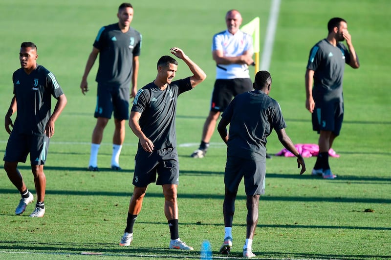 Cristiano Ronaldo training with teammates. AFP