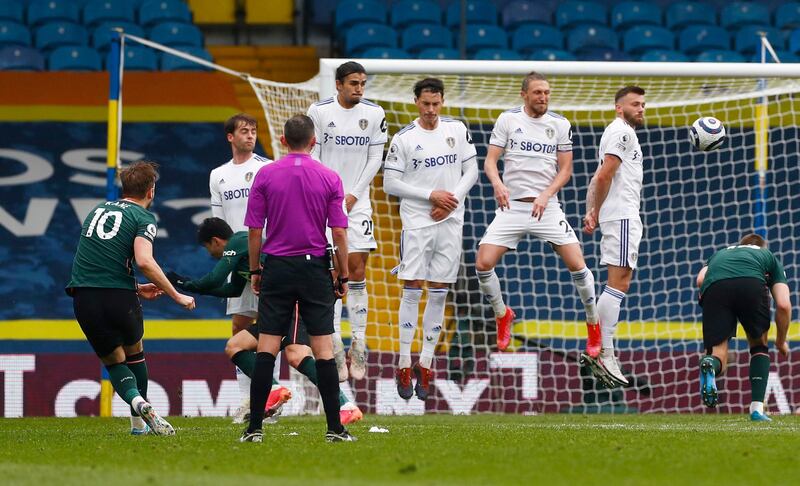 Spurs striker Harry Kane shoots at goal from a free-kick. Reuters