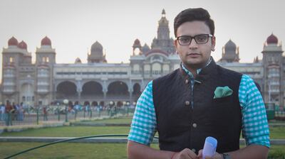 Yaduveer Wadiyar against the backdrop of Mysore Palace. Photo: Yaduveer Wadiyar