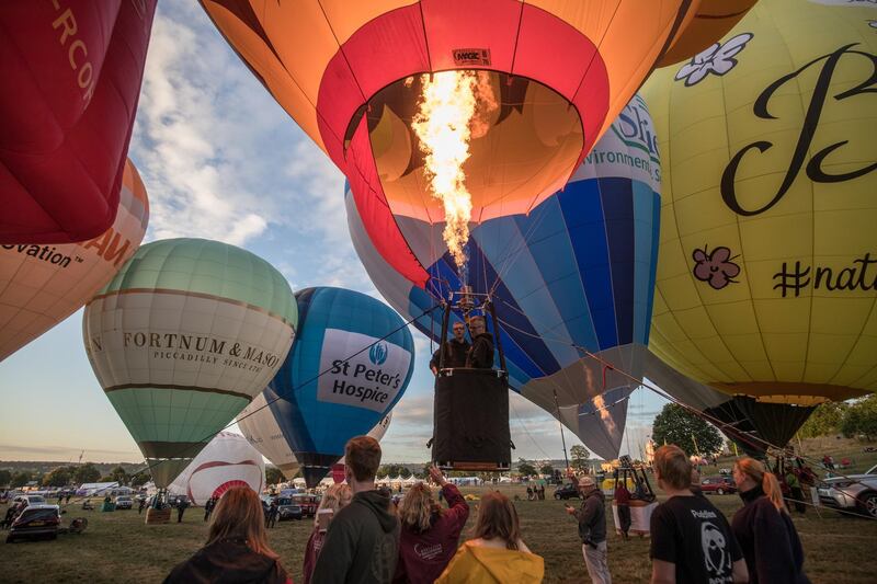 A tethered balloon lights its burners. Getty Images