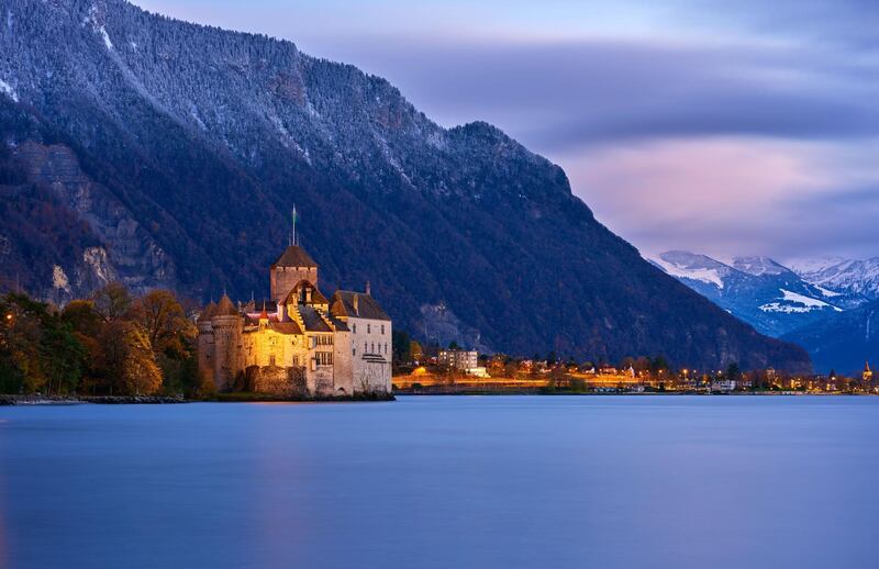 Chateau de chillon of geneva lake at dusk, Montreux, Switzerland. Getty Images