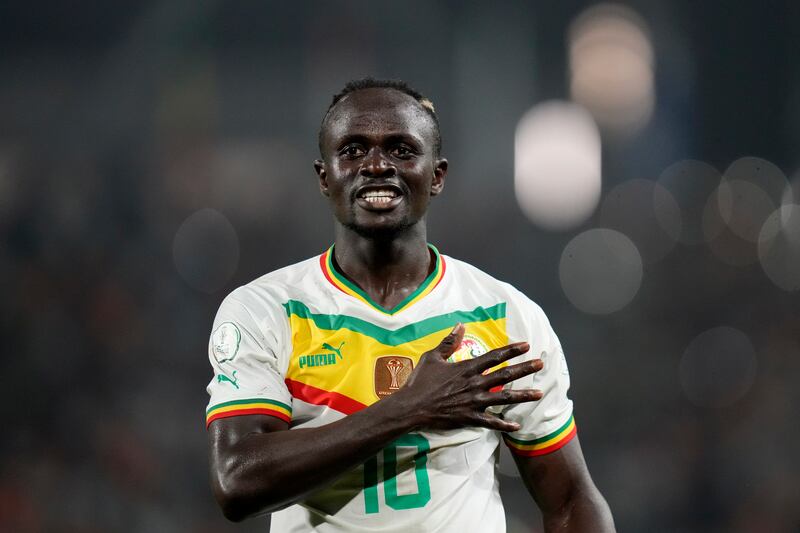 Senegal's Sadio Mane celebrates after scoring his side's third goal during their African Cup of Nations match against Cameroon in Yamoussoukro, Ivory Coast. AP Photo