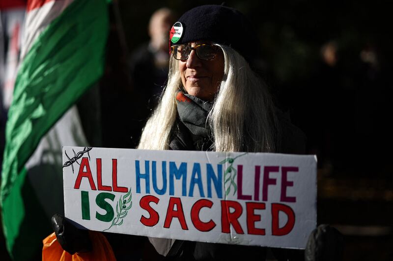 A protester attends a gathering in Belgrave Square, calling for a 'Ceasefire Now', during a demonstration organised by the group Jews For Palestine, in London on Saturday, before a 'National March For Palestine'.  AFP
