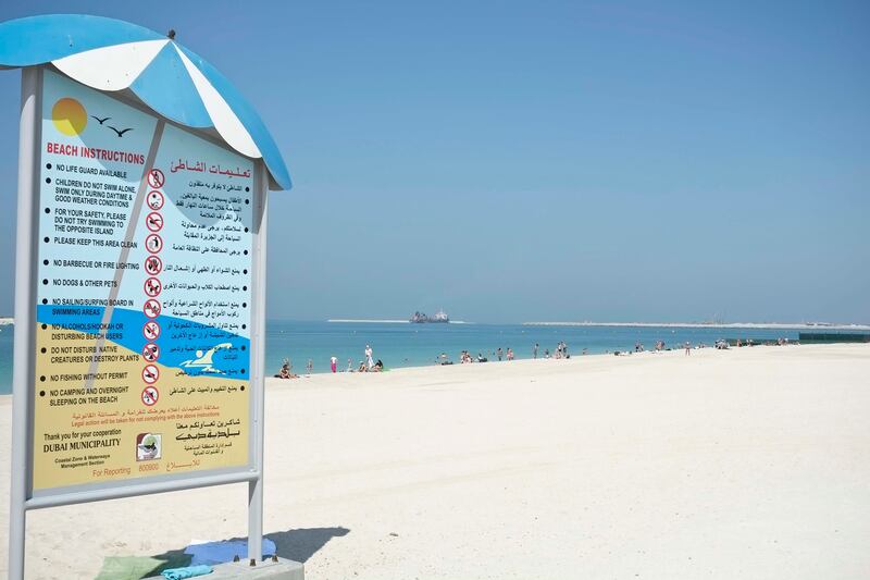 DUBAI, UNITED ARAB EMIRATES,  OCTOBER 30, 2013. Plans are underway after the anouncement of the Dubai Creek Extension Project that will extend from where the creek currently end near Sheik Zayed Rd to the ocean at Jumeirah Beach Park. Tourists enjoy the sunshine on the open beach next to Jumeirah Beach Park. (Photo: Antonie Robertson/The National) Journalist Mitya Underwood. Section: National *** Local Caption ***  AR_3010_Creek_Extension-32.jpg