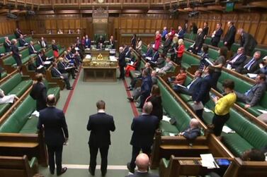 A video grab from footage broadcast by the UK Parliament shows MPs in a largely empty chamber during the weekly Prime Minister's Question time (PMQs) on March 18, 2020. AFP Photo/PRU