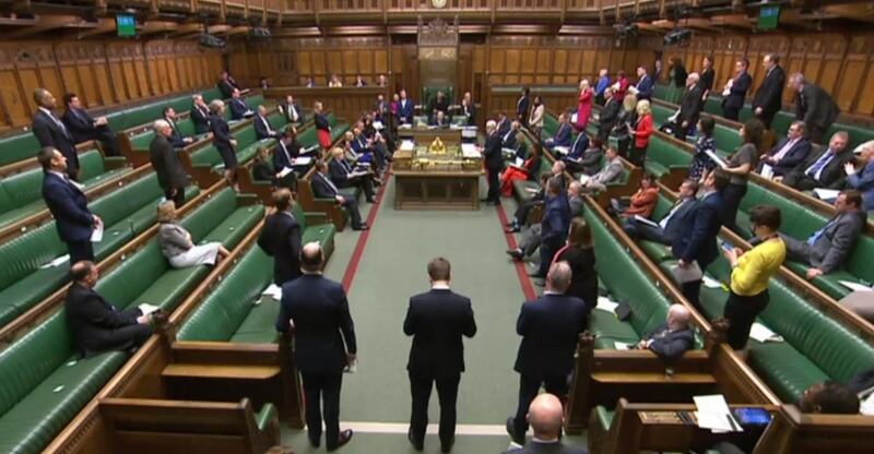 A video grab from footage broadcast by the UK Parliament's Parliamentary Recording Unit (PRU) shows Members of Parliament in the chamber as the weekly Prime Minister's Question time (PMQs) is underway in the House of Commons in London on March 18, 2020. The British government will on Wednesday unveil a raft of emergency powers to deal with the coronavirus epidemic, including proposals allowing police to detain potentially infected people to be tested. - RESTRICTED TO EDITORIAL USE - MANDATORY CREDIT " AFP PHOTO / PRU " - NO USE FOR ENTERTAINMENT, SATIRICAL, MARKETING OR ADVERTISING CAMPAIGNS
 / AFP / PRU / - / RESTRICTED TO EDITORIAL USE - MANDATORY CREDIT " AFP PHOTO / PRU " - NO USE FOR ENTERTAINMENT, SATIRICAL, MARKETING OR ADVERTISING CAMPAIGNS
