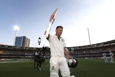 BRISBANE, AUSTRALIA - NOVEMBER 22: David Warner of Australia raises his bat as he leaves the ground at stumps on 151 not out during day two of the 1st Domain Test between Australia and Pakistan at The Gabba on November 22, 2019 in Brisbane, Australia. (Photo by Ryan Pierse/Getty Images)