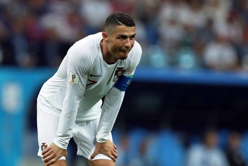epa06853399 Cristiano Ronaldo of Portugal reacts during the FIFA World Cup 2018 round of 16 soccer match between Uruguay and Portugal in Sochi, Russia, 30 June 2018.

(RESTRICTIONS APPLY: Editorial Use Only, not used in association with any commercial entity - Images must not be used in any form of alert service or push service of any kind including via mobile alert services, downloads to mobile devices or MMS messaging - Images must appear as still images and must not emulate match action video footage - No alteration is made to, and no text or image is superimposed over, any published image which: (a) intentionally obscures or removes a sponsor identification image; or (b) adds or overlays the commercial identification of any third party which is not officially associated with the FIFA World Cup)  EPA/MOHAMED MESSARA   EDITORIAL USE ONLY