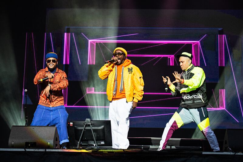 From left, singers apl.de.ap, will.i.am and Taboo of Black Eyes Peas will perform at Expo 2020 Dubai in January. Invision / AP